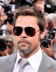 Sunglasses add sex appeal .(Like Brad Pitt needs an extra helping!) 